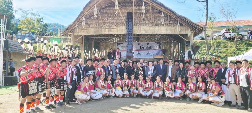 MLA Ar Jwenga Seb, NIDC chairman Kvulo Lorin and other dignitaries with cultural troupe during Ngada festival at Tseminyu on November 28. (Morung Photo)