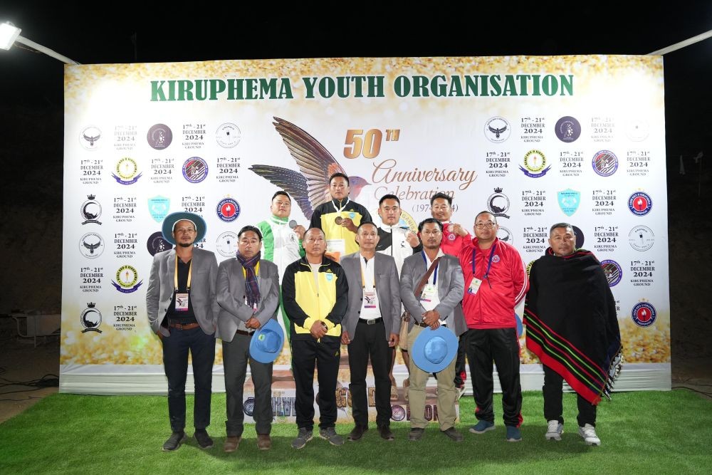 KYO 50th anniversary wrestling champions with KYO officials on December 17.