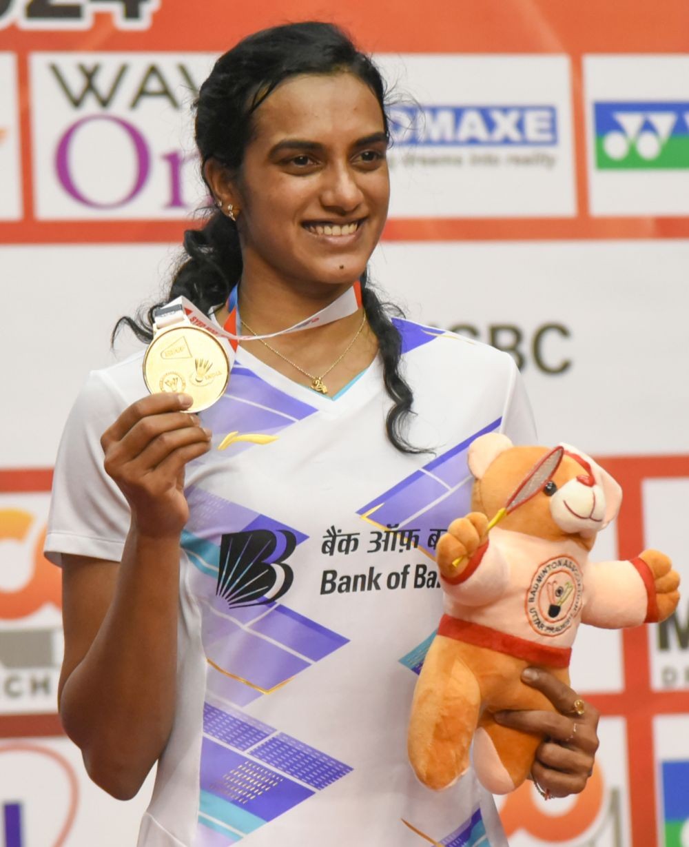 Lucknow: India's PV Sindhu poses with her medal after winning the final match against China's Wu Luo Yu during the Syed Modi India International Badminton Championship at the BBD Badminton Academy in Lucknow on Sunday, December 1, 2024. (Photo: IANS/Phool Chandra)
