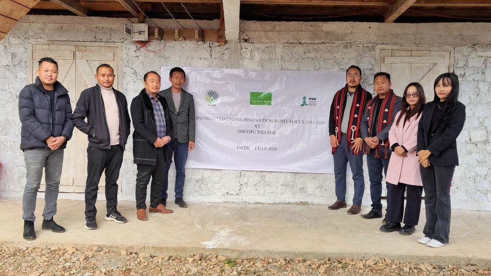 Officials and others during the inauguration of a project in Zunheboto on December 18.