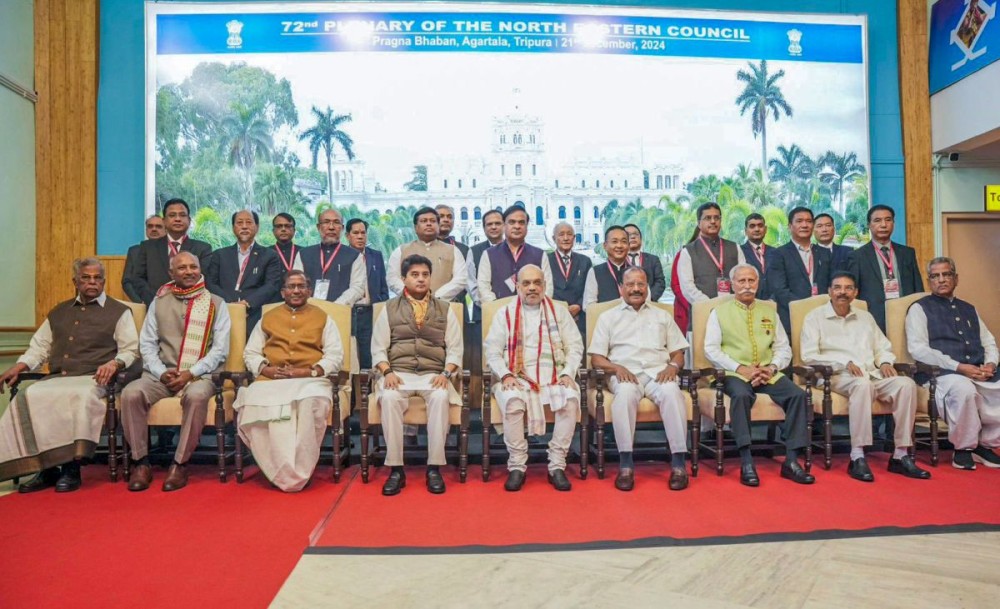 Agartala: Union Home Minister Amit Shah, Union Minister Jyotiraditya Scindia, and other dignitaries pose for a group photograph during the 72nd Plenary Session of the North Eastern Council in Agartala on Saturday, December 21, 2024. (Photo: IANS)