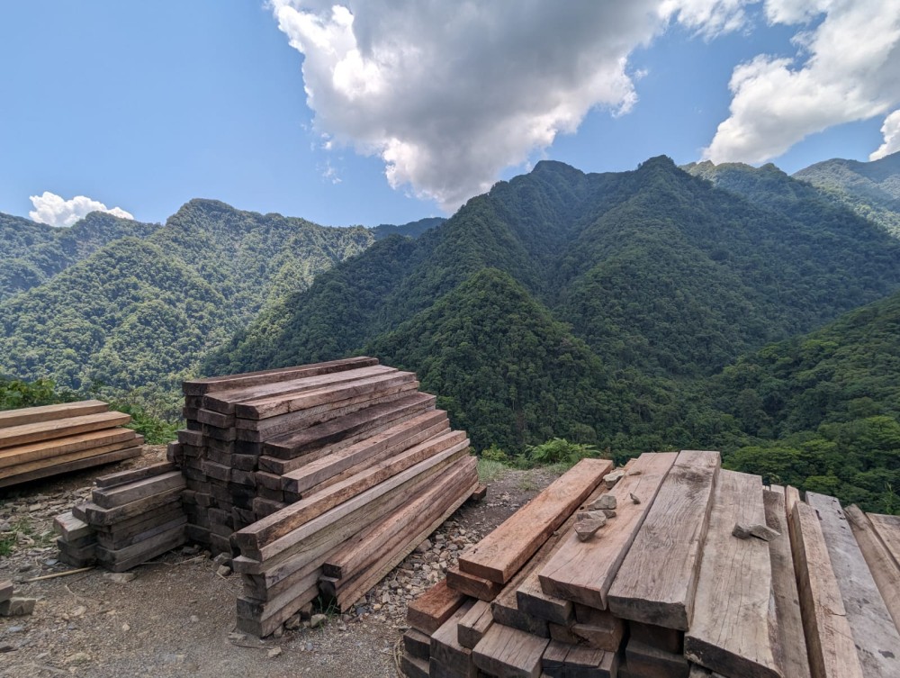Piles of lumber near a forested area somewhere in Noklak. According to the India State of Forest Report (ISFR) 2021, Nagaland's forest cover has declined by 235 square kilometers from 2019 to 2021.