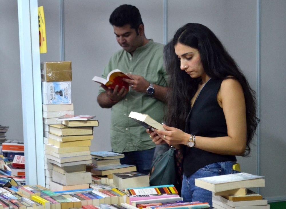 New Delhi: Reading enthusiast visits Delhi Book fair at Pragati maidan in New Delhi on Wednesday August 07, 2024. (Photo: IANS)