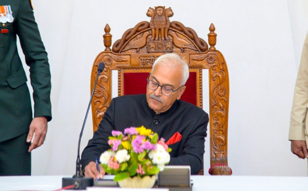 Imphal: Newly-appointed Governor of Manipur Ajay Kumar Bhalla signs a document after taking oath during the swearing-in ceremony at the Raj Bhavan in Imphal on Friday, January 03, 2025. (Photo: IANS)