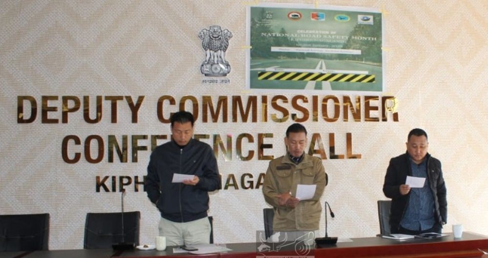 Officers taking Road safety pledge during the inaugural session of road safety month held at DC’s Conference Hall, Kiphire. (DIPR Photo)