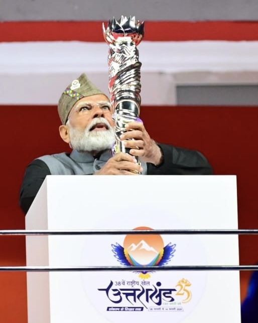 Dehradun: Prime Minister Narendra Modi attends the inauguration of the 38th National Games at Maharana Pratap Sports Complex in Dehradun, Uttarakhand, on Tuesday, January 28, 2025. Uttarakhand Chief Minister Pushkar Singh Dhami also seen. (Photo: IANS)