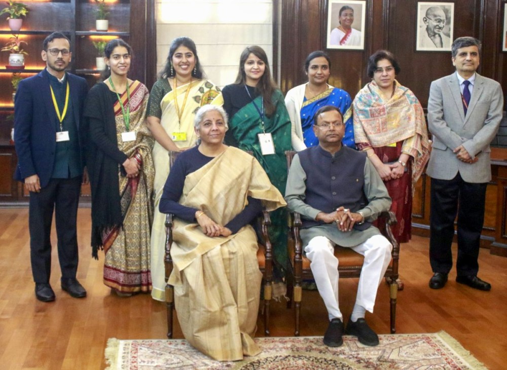 New Delhi: Union Finance Minister Nirmala Sitharaman with Minister of State for Finance Pankaj Chaudhary and her team of officials pose for a group photograph a day before presenting the Union Budget 2025, at her North Block office in New Delhi on Friday, January 31, 2025. (Photo: IANS/Qamar Sibtain)