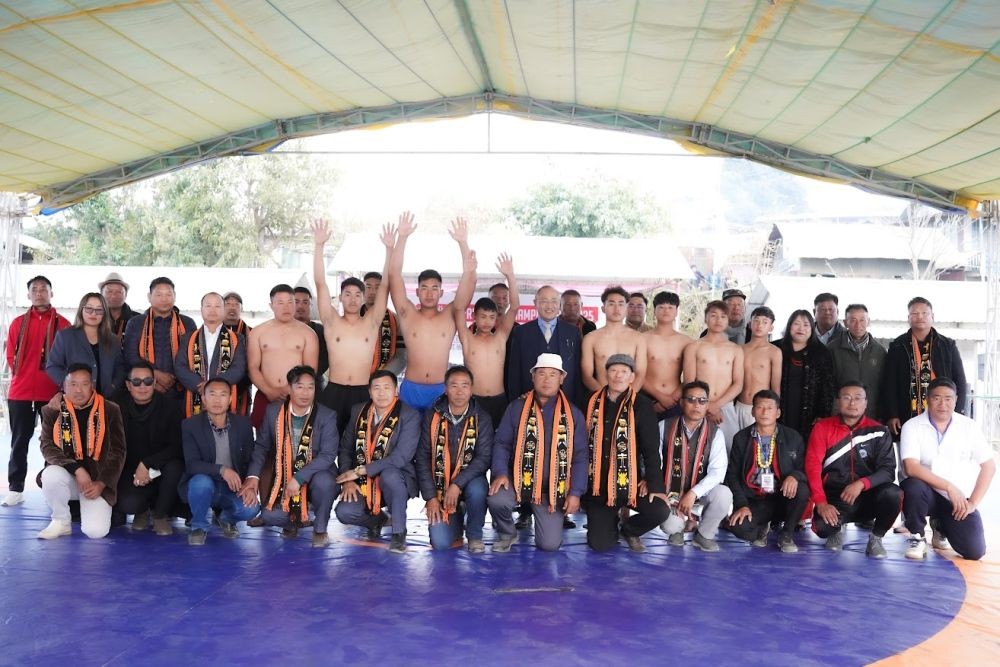 Winners of the Kikruma Wrestling Championship 2025 with officials.