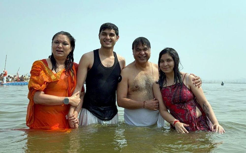 Prayagraj: Assam Chief Minister Himanta Biswa Sarma, along with family, takes a holy dip at Triveni Sangam, the confluence of the Ganga, Yamuna, and the mythological Saraswati rivers, during the ongoing Maha Kumbh Mela 2025 in Prayagraj on Friday, February 21, 2025.(IANS)