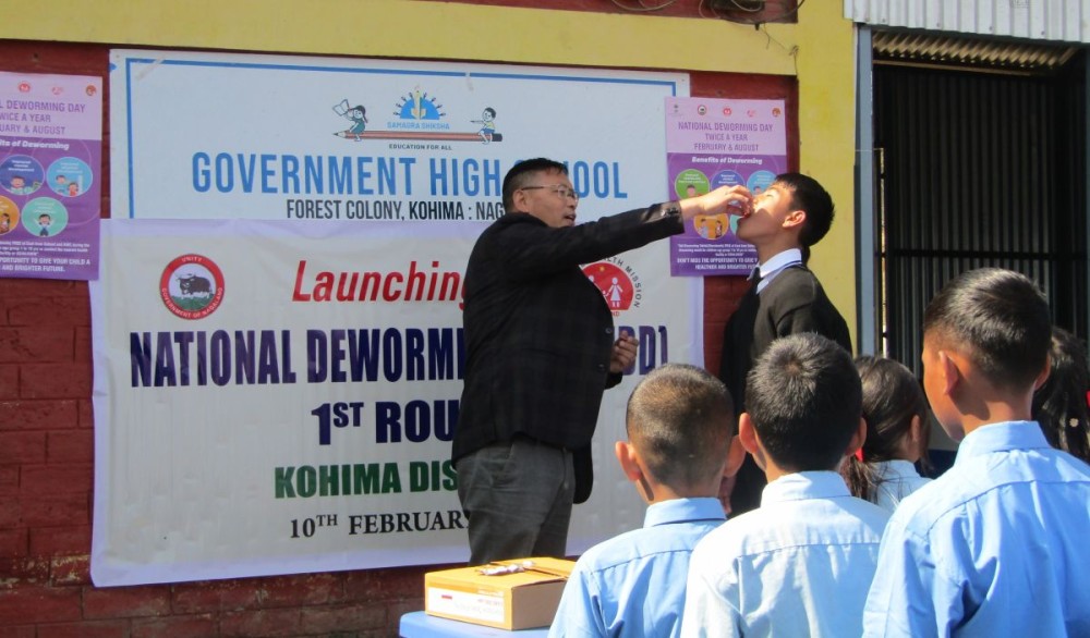 Dr Khrievilhou Nakhro, DPO (RMNCAH+N) gives deworming tablet to students during the National Deworming Day programme at GHS, Forest colony, Kohima on February 10.