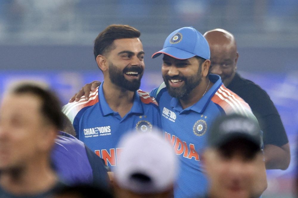 Dubai: India's Virat Kohli and captain Rohit Sharma celebrate their team's victory in the ICC Champions Trophy final cricket match against New Zealand at Dubai International Cricket Stadium in Dubai on Sunday, March 9, 2025. (Photo: IANS)