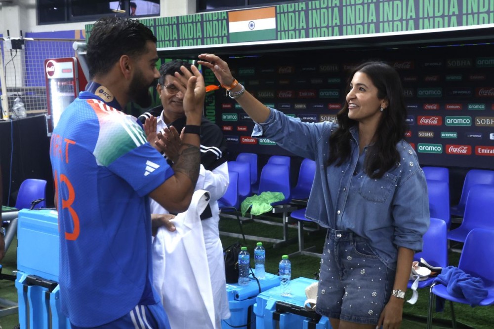 Dubai: India's Virat Kohli with his wife Anushka Sharma after India won the final cricket match of the ICC Champions Trophy against New Zealand at Dubai International Cricket Stadium in Dubai on Sunday, March 9, 2025. (Photo: IANS)