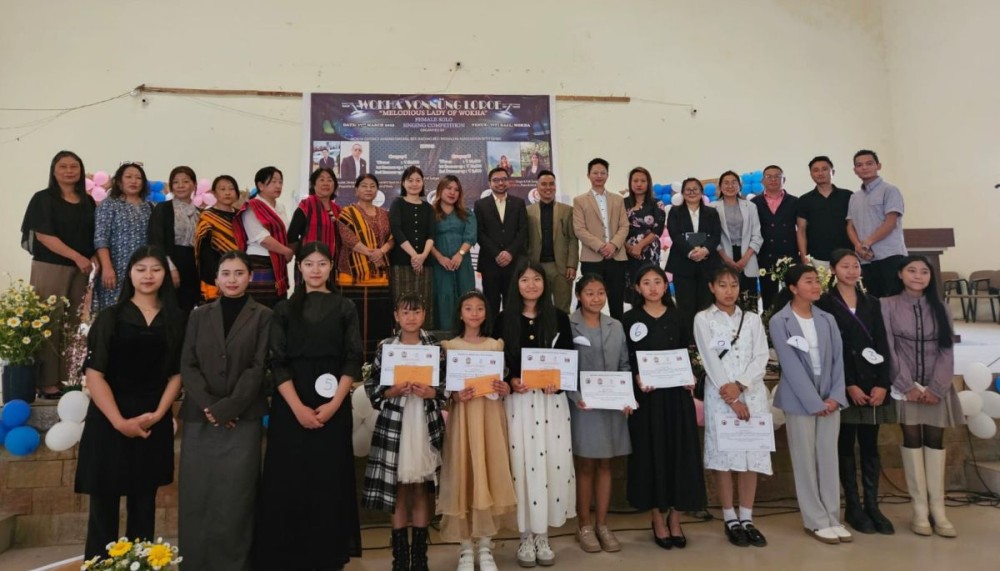 DC Wokha Vineet Kumar IAS with the winners of Melodious Lady of Wokha and officials at Tiyi Hall, Wokha on March 17. (DIPR Photo)