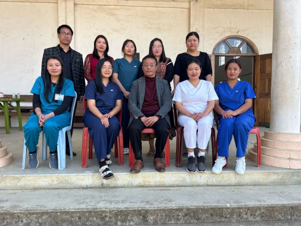 Dr. N. Mhonchan Kithan, Medical Superintendent of DMMDH, along with staff and church officials at Samyan Baptist Church during the campaign.