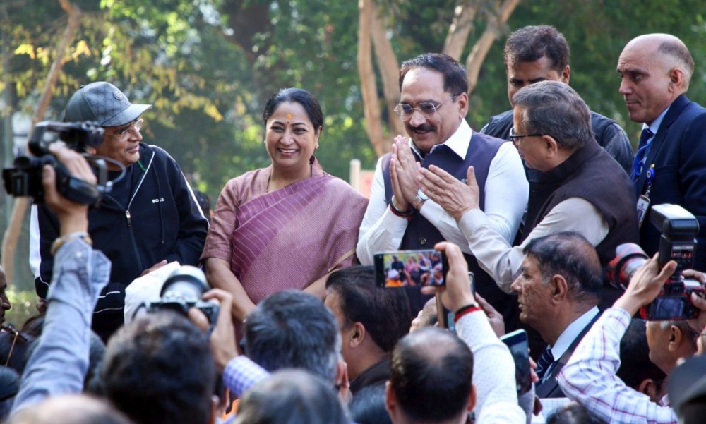 New Delhi: Delhi Chief Minister Rekha Gupta along with Delhi BJP President Virendra Sachdeva and Delhi Minister Parvesh Verma during 'Holi Mangal Milan' organized by the Religious Ramlila Committee at Lodhi Garden in New Delhi on Sunday, March 09, 2025. (Photo: IANS)