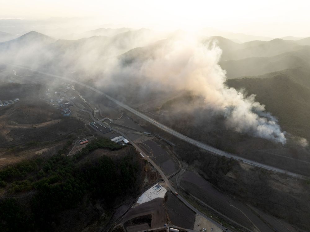 Smoke rises from a mountain in Andong, North Gyeongsang Province, on March 29, 2025. (Yonhap/IANS Photo)