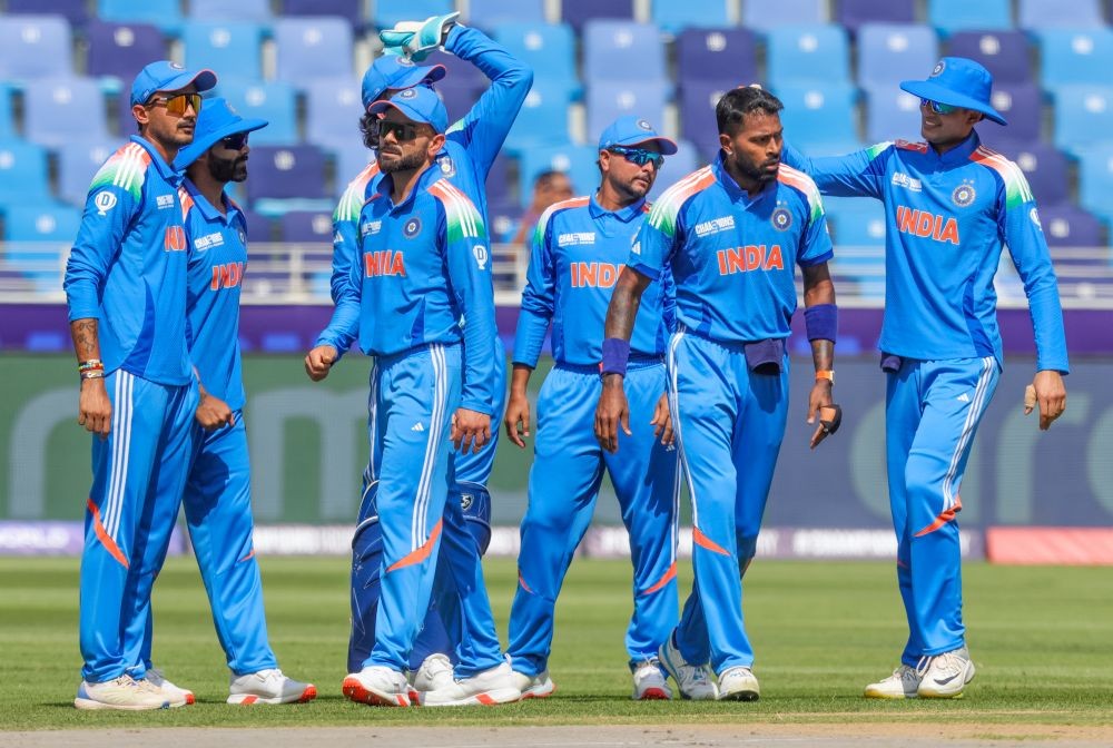 Dubai: India's Hardik Pandya celebrates with teammates after dismissing Pakistan's Babar Azam during the ICC Champions Trophy match between Pakistan and India at Dubai International Stadium, in Dubai, on Sunday, February 23, 2025. (Photo: IANS/Raj Kumar)