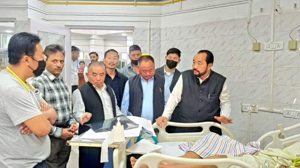 Deputy Chief Minister, Yanthungo Patton along with other officials  visit those injured at Naga Hospital Authority, Kohima on March 31. (Photo Courtesy: @YanthungoPatton/X)