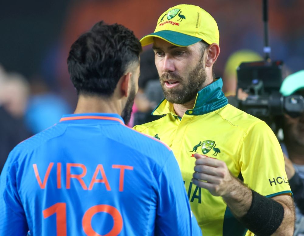 Ahmedabad: Australia's Gelnn Maxwell talks with India's Virat Kohli after Australia won the ICC Men's Cricket World Cup 2023 final match at the Narendra Modi Stadium, in Ahmedabad on Sunday, November 19, 2023. (Photo: IANS/Biplab Banerjee)