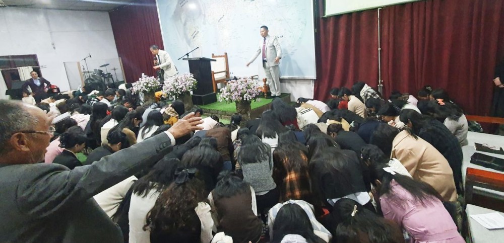 Special prayers for the teenagers by Rev Dr Zotuo and Dr Kip Rio.