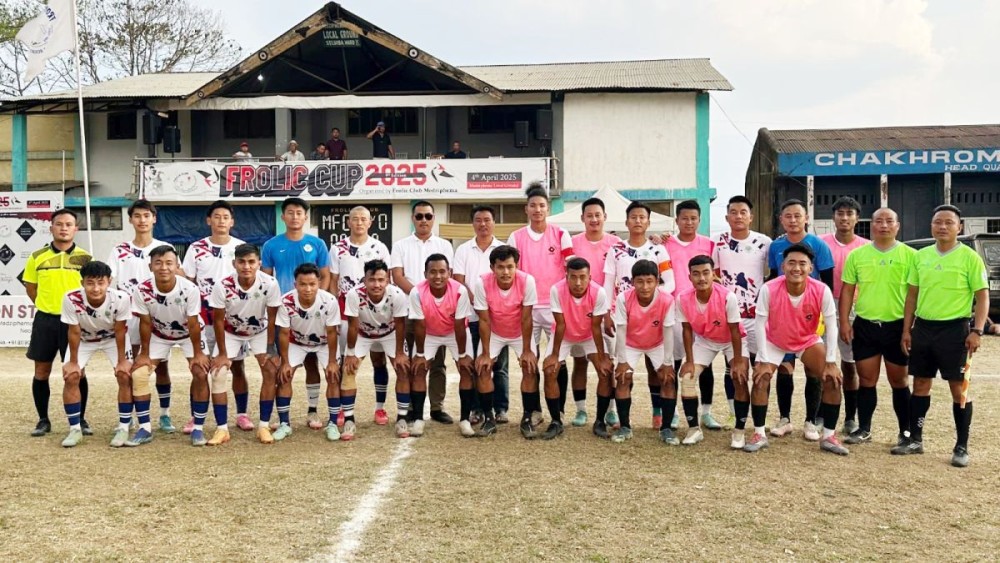 MVYO (white) and Medziphema FC (pink) pose for the camera ahead of their semi-final match.