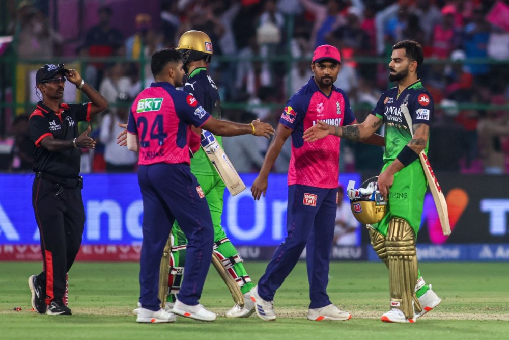 Jaipur: Royal Challengers Bengaluru's Devdutt Padikkal and Virat Kohli greet Rajasthan Royals players at the end of the IPL 2025 match against Rajasthan Royals at Sawai Mansingh Stadium in Jaipur on Sunday, April 13, 2025. (Photo: IANS/Biplab Banerjee)