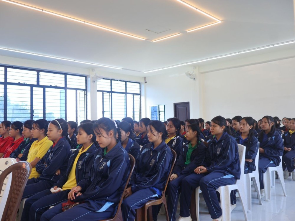 Students of Agape Higher Secondary School attend a session on “Community-Based & Sustainable Tourism” conducted by Longtili C. Sangtam at the school auditorium in Kiphire.