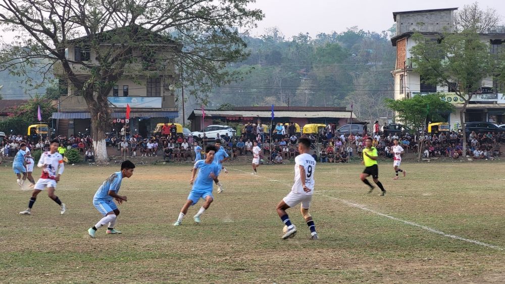 MVYO (white) in action against Simlai FC (blue) during their 2-1 win in a tightly contested match of the Frolic Cup.