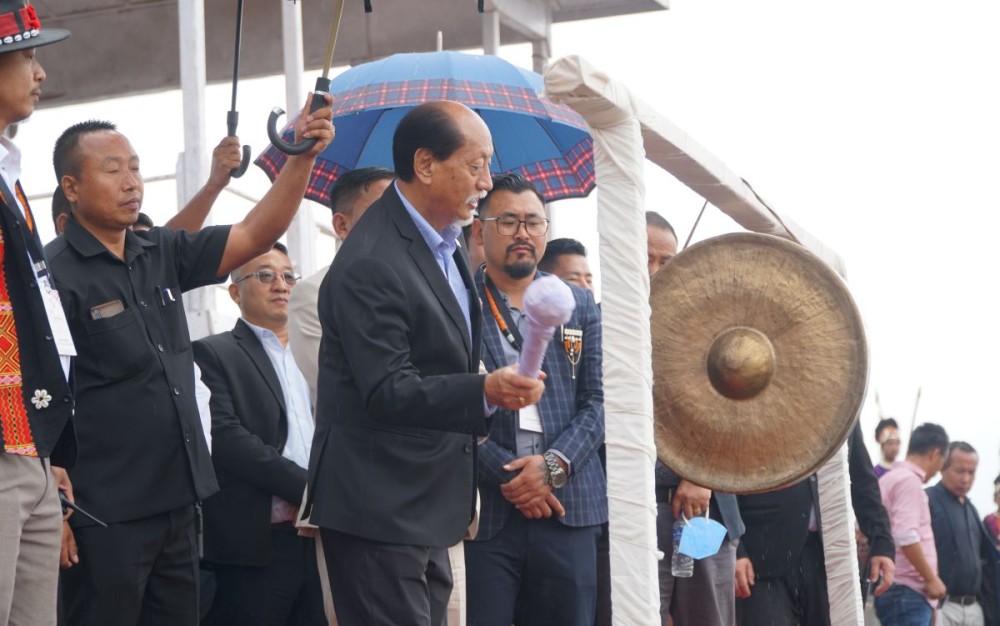 Nagaland Chief Minister Neiphiu Rio beats the traditional gong at the 8th ENSF Cultural Fiesta cum General Conference at the Parade Ground in Tuensang on April 15. (Morung Photo)