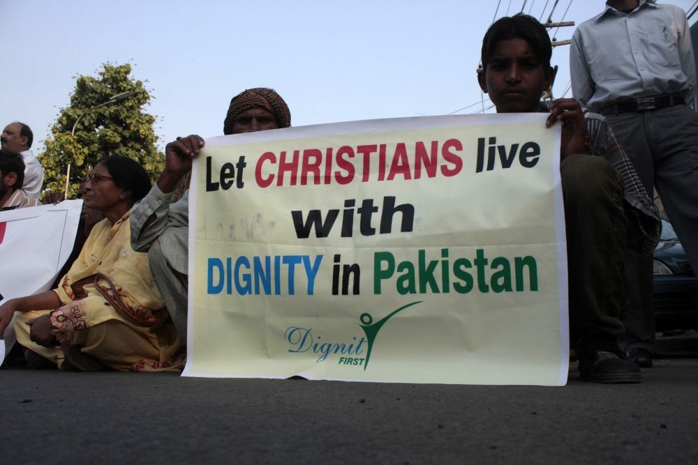 People attend a protest against the killing of a Christian couple in Lahore, Pakistan on Nov. 6, 2014. An enraged Muslim mob beat a Christian couple to death in Pakistan and burnt their bodies in the brick kiln where they worked for allegedly desecrating a Quran, local media reported. (Xinhua/Jamil Ahmed/IANS File Photo)