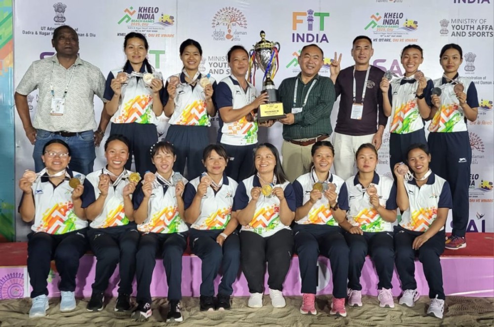 Nagaland Sepaktakraw women team, coach with their trophy and medals.