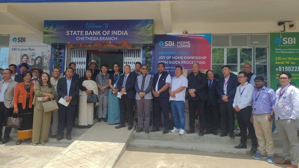 Kudecho Khamo and others during the inauguration of SBI Chetheba branch on June 9 at Chetheba. (Morung Photo)