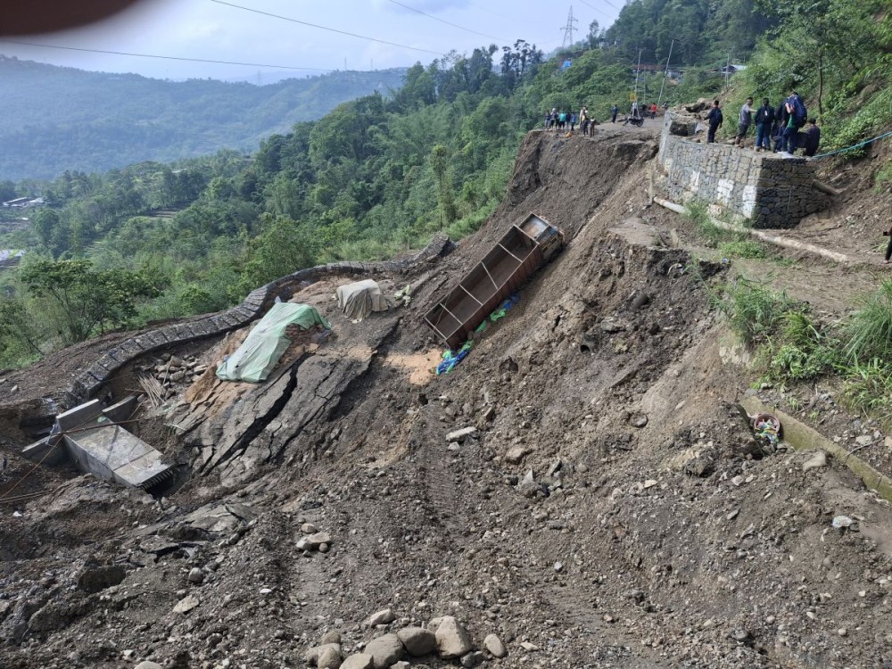 Total collapse of massive road sinking on NH- 2. Morung Photo
