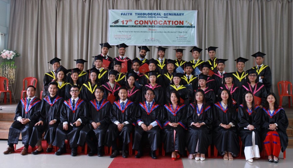 Dignitaries with graduated students of FTS on June 2.