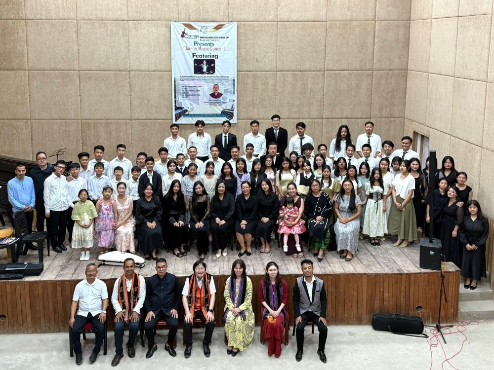 Dignitaries with performers of an evening of orchestral music in Kohima on July 30.