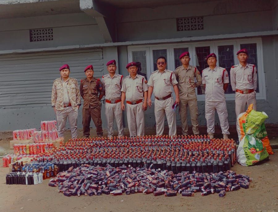 Excise personnel of Zunheboto District pose with seized liquor following a series of surprise raids and highway checks under the NLTP Act enforcement during June and July 2025.