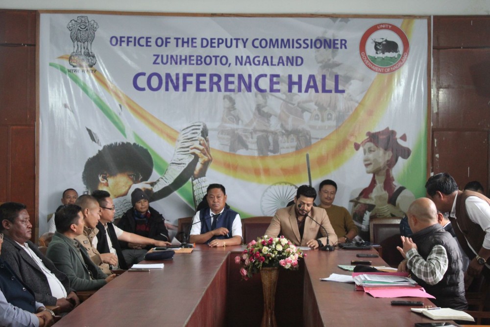 S Toiho Yepthomi, Deputy Speaker of the Nagaland Legislative Assembly and Chairman of the DPDB Zunheboto, alongside Deputy Commissioner Dharam Raj, IAS, chairing the meeting on July 16. (Morung Photo)