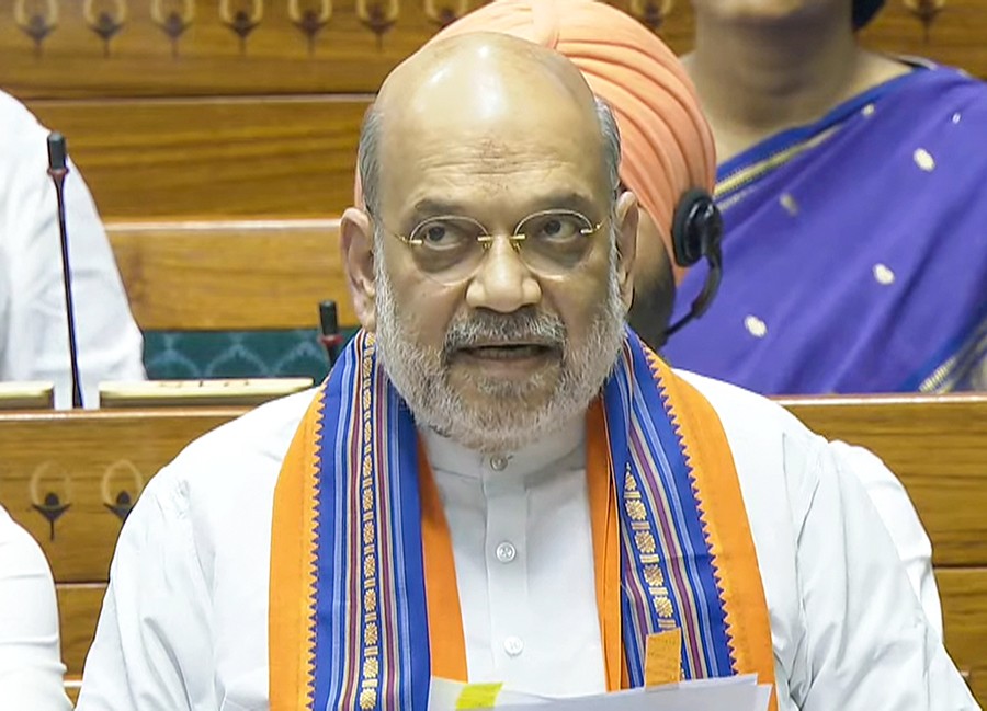 Union Home Minister Amit Shah speaks in the Lok Sabha during the monsoon session of Parliament, in New Delhi on Wednesday, Aug 20, 2025. (Photo: IANS/Sansad TV)