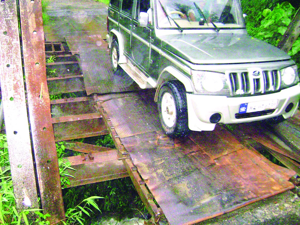 The bailey bridges along National Highway 155, connecting Mokokchung to Tuensang and other interior districts are in very bad shape. There are six bailey bridges from Mokokchung to Tuensang- all in hazardous conditions. The bridges have exceeded their life span and have become life threatening. The metal sheets are no longer attached to the iron angles below and are scattered haphazardly. The Dikhu Bridge which fell apart earlier this year is still in same condition. Sometimes travelers have to get down from their vehicle to adjust the metal sheets for the vehicle to ply.  The Nagaland State Transport department incurred loses of Rs. 12 crore last year, owing mostly to bad road conditions. The public works department had said that the bridges would be replaced with concrete ones. However, if not done soon, the bridges would no longer be pliable in days to come given the existing vulnerable conditions.