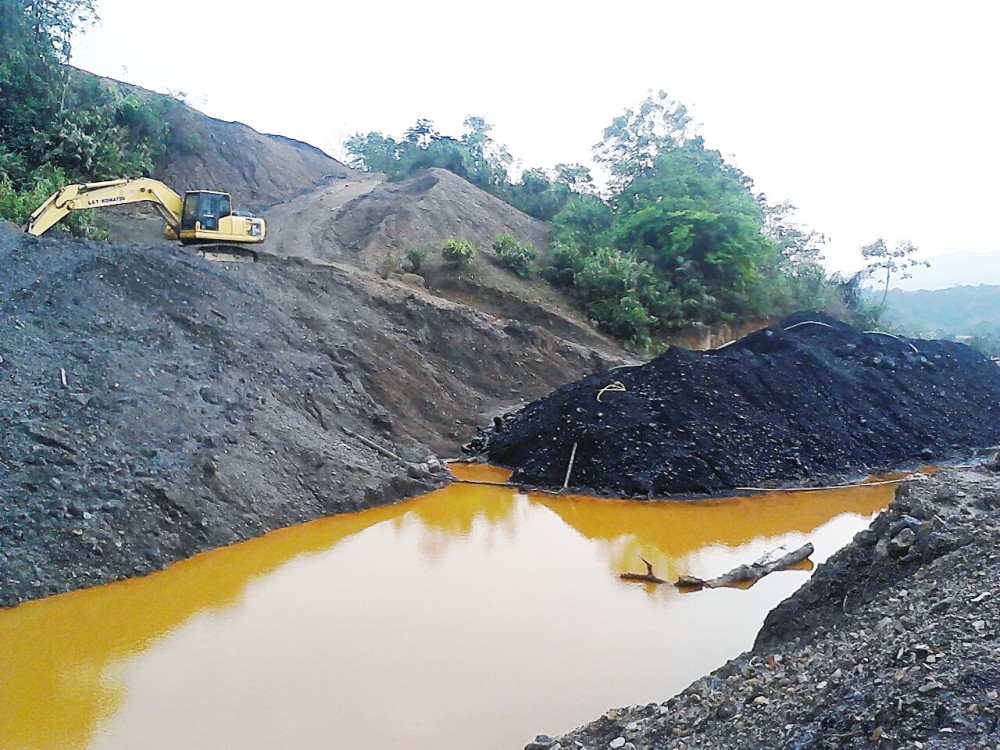 A contaminated body of water at a coal extraction area between Longnak and Mangkolemba sub-division under Mokokchung district.