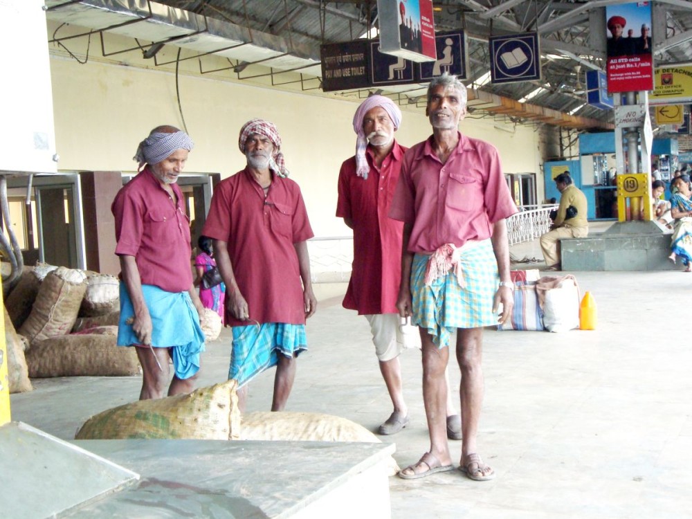 Age does not deter their spirit: Some of the old licensed porters at Dimapur Railway Station. (Morung Photo/Zakir Hussain)