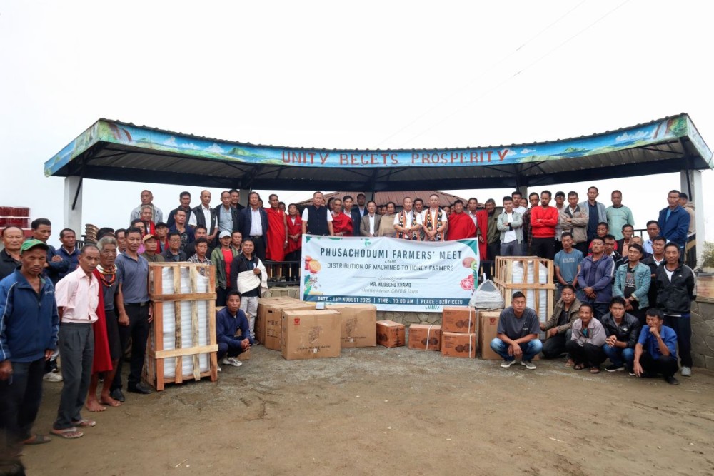 Kudecho Khamo and others during the distribution of machines to honey farmers at Phusachodu village on August 13. (Morung Photo)