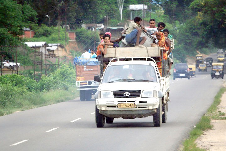 Vehicles ply along the National Highway in Dimapur. Without commercial roads for trucks and other heavy vehicles, added to the poor road conditions throughout the state, Nagaland’s economy suffers heavy loses. (Sorei Mahong photo)