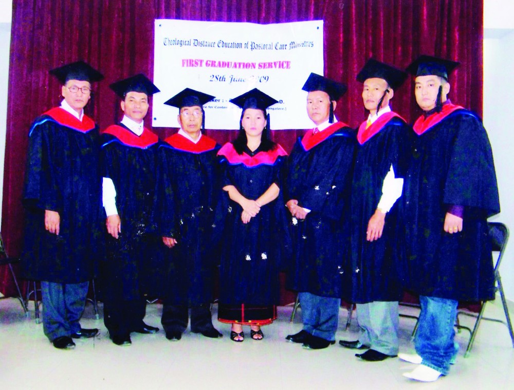 Shitozu Zhimomi (third from left) along with his classmates at his graduating service in Bangalore in 2009.