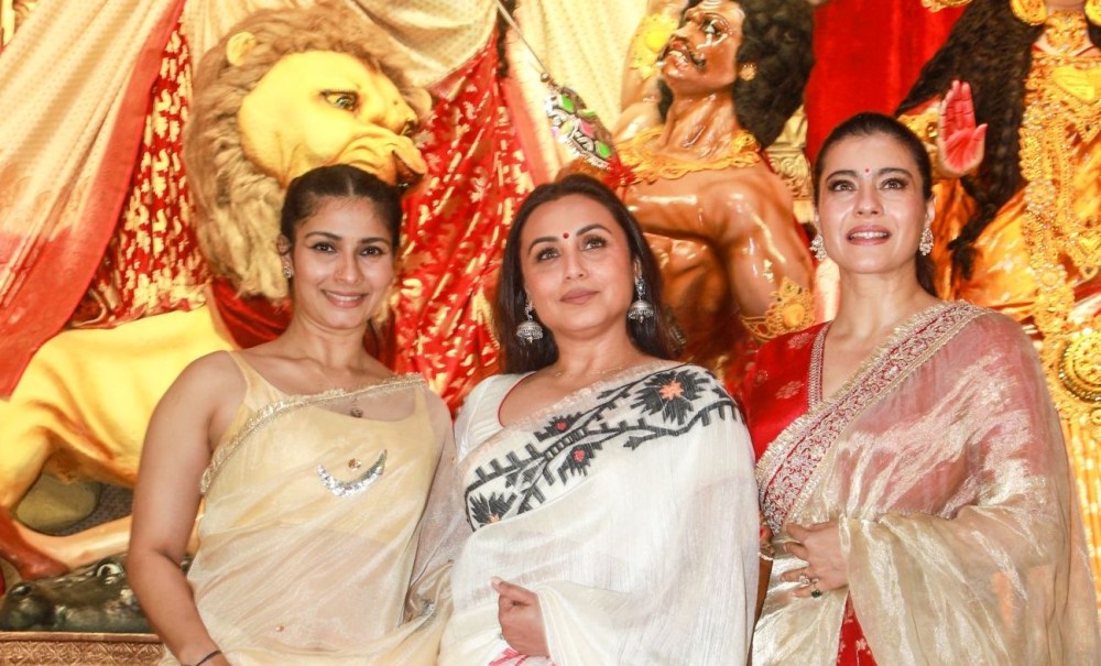 Mumbai: Actress Tanishaa, Rani Mukerji and Kajol attend the unveiling of Goddess Durga idol at the North Bombay Sarbojanin Durga Puja Samiti in Mumbai on Saturday, September 27, 2025. (Photo: IANS)