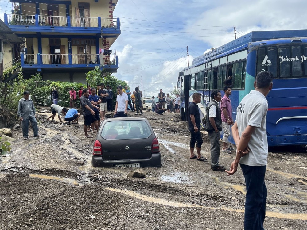 Vehicles submerged in mudslide which occurred at Saron Colony, Ward 15, Wokha town on September 24. (Morung Photo)