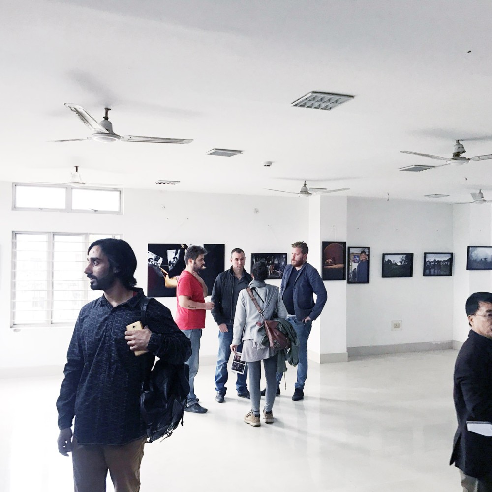 People attend Zubeni Lotha’s photo exhibition, ‘Looking at the Tree Again’, being held at the Assam State Museum in Guwahati from December 19-24, 2017. (Photo courtesy Zubeni Lotha)
