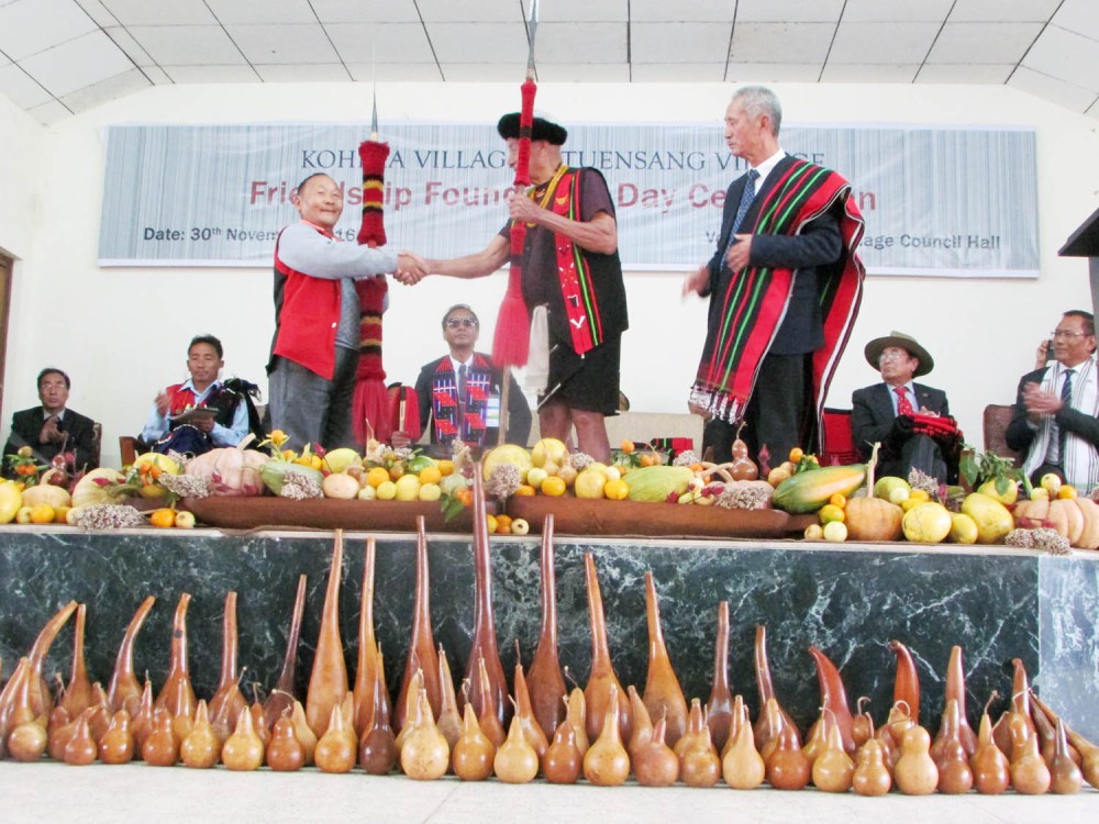 Leaders exchange spears as a sign of friendship treaty between Kohima Village and Tuensang Village at the Kohima Village Council Hall on November 30. (Morung Photo)