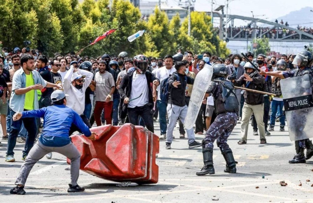 Kathmandu: Gen Z group clashes with police near the Federal Parliament building during a protest against corruption and the government’s ban on social media platforms, in Kathmandu, Nepal, on Monday, September 8, 2025. (Photo: IANS)