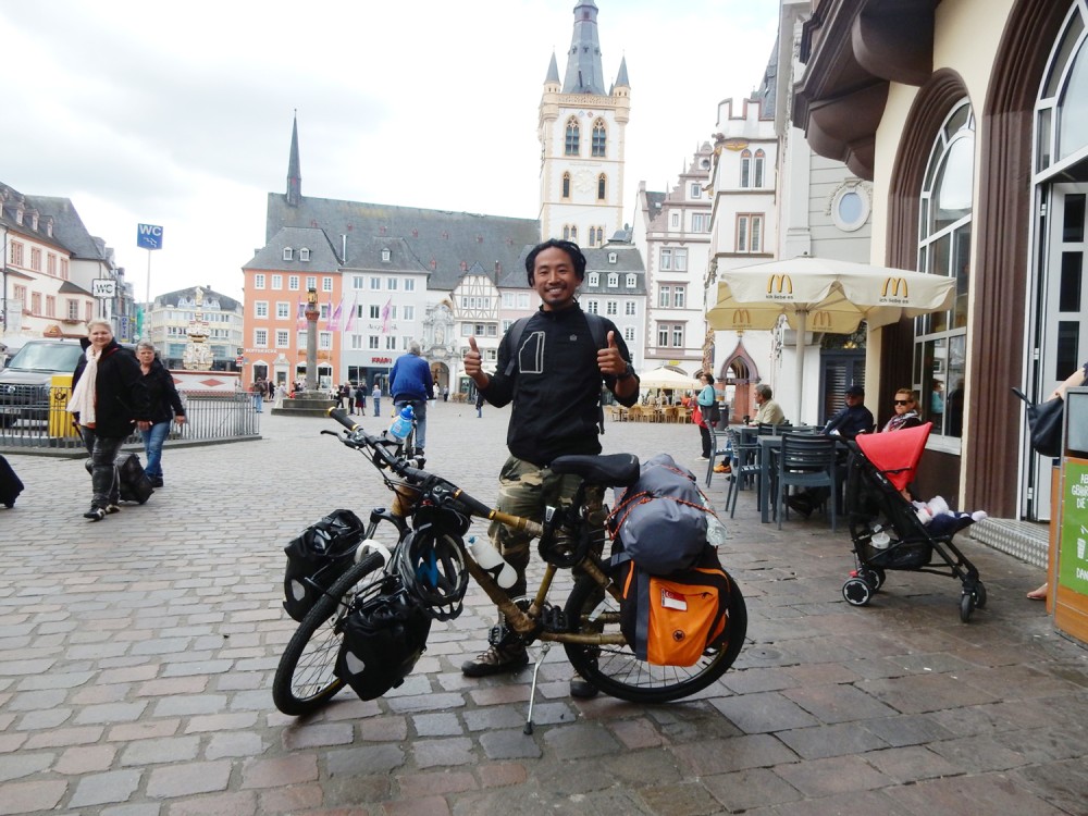 A photo of Sievituo Solo taken during his journey on a bamboo cycle across Europe.